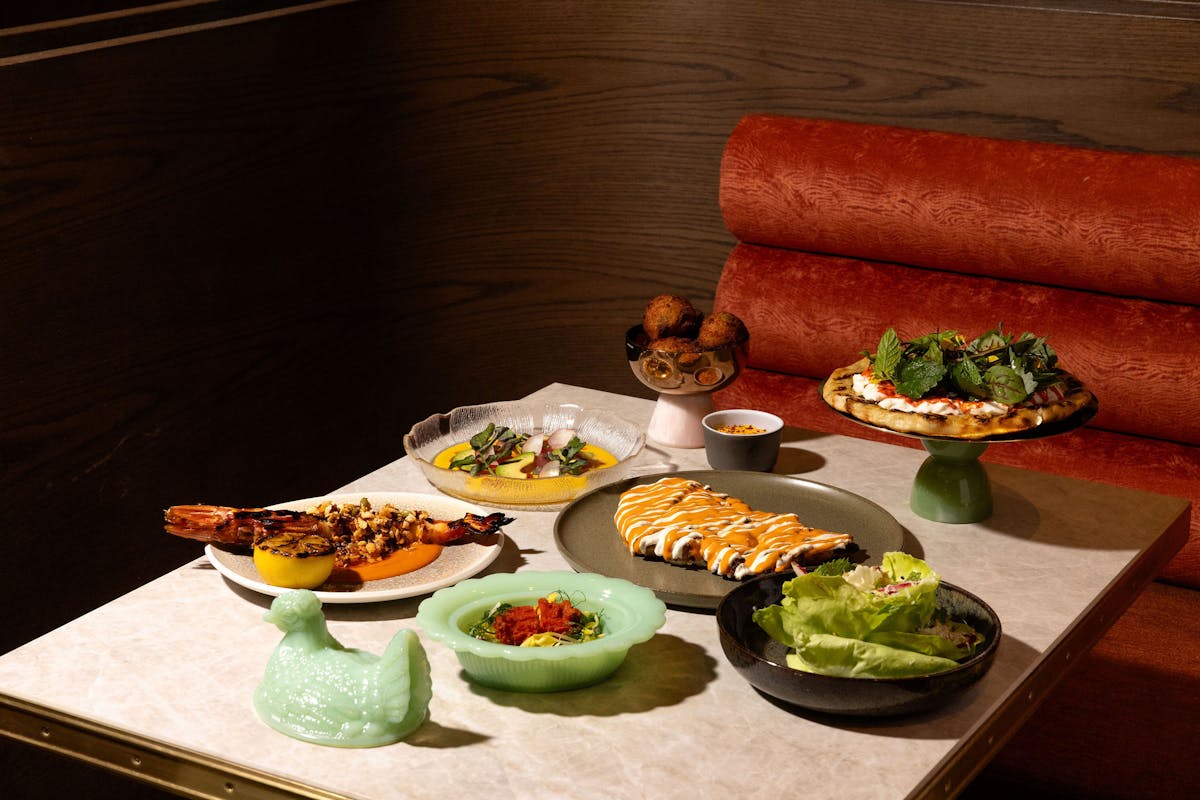 Private dining and celebration setup at Markette Restaurant in Chelsea NYC, featuring elegant table settings and warm lighting near Madison Square Garden.