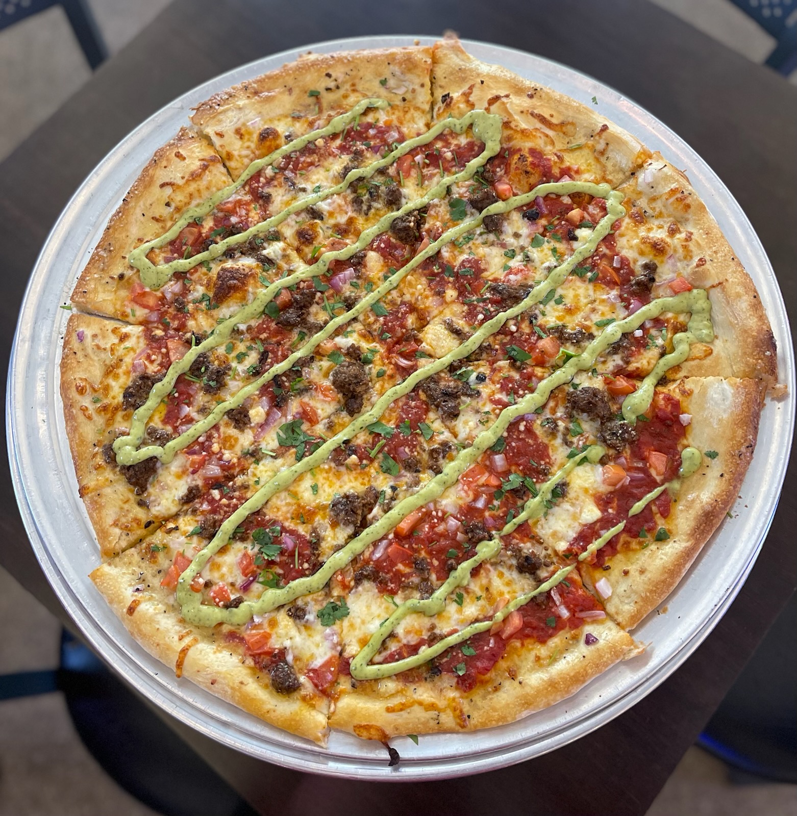 a pizza sitting on top of a table