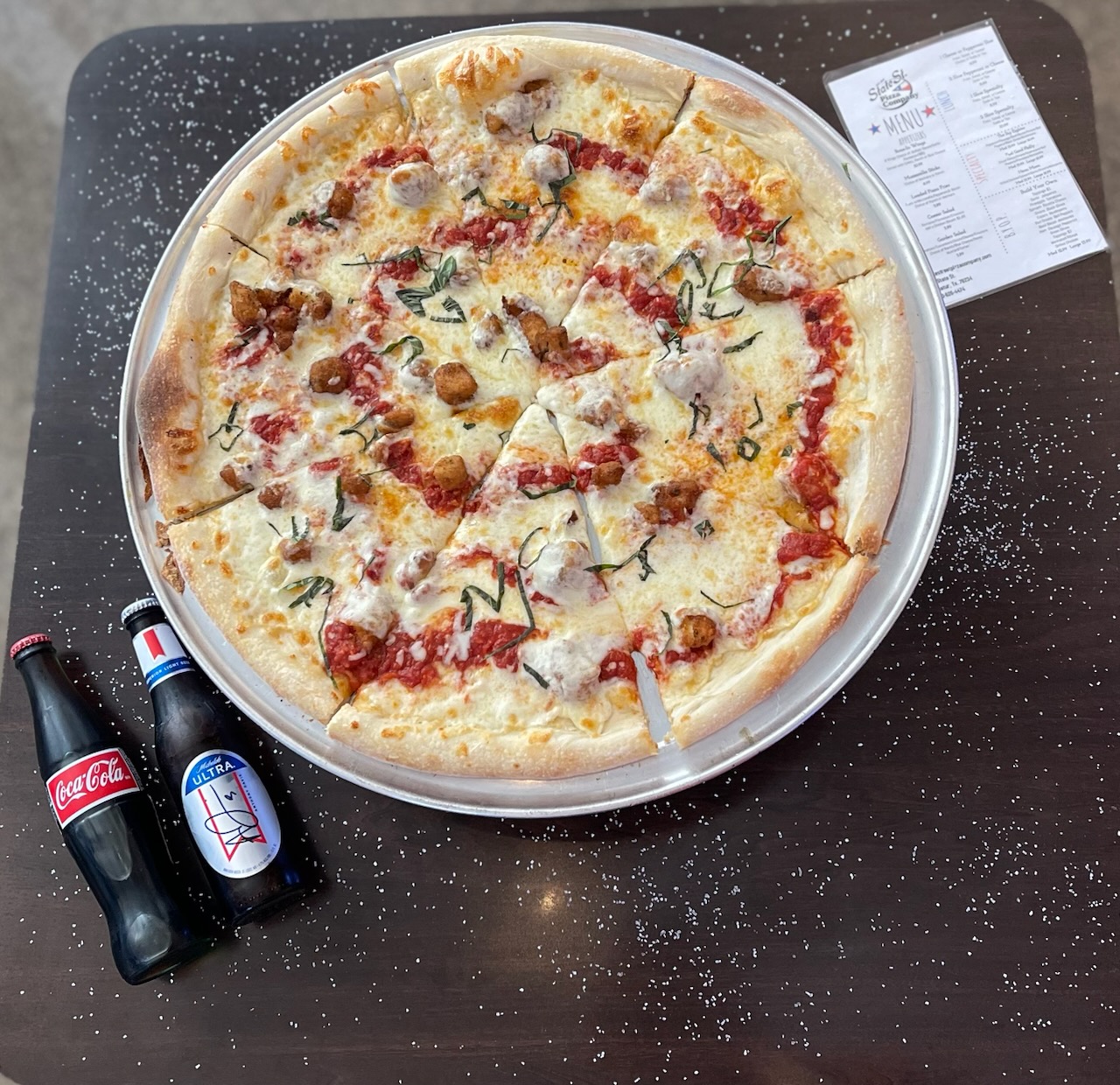 a pizza sitting on top of a table