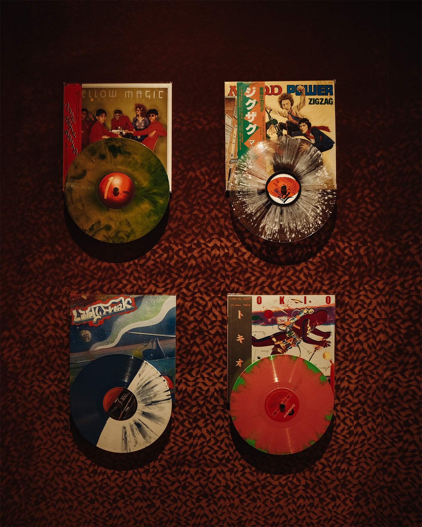 a group of cd cases on a surface