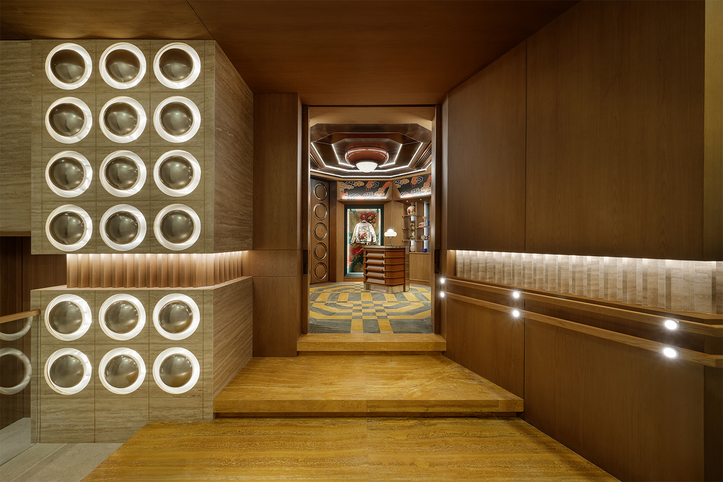 a hallway with lights and a wood floor