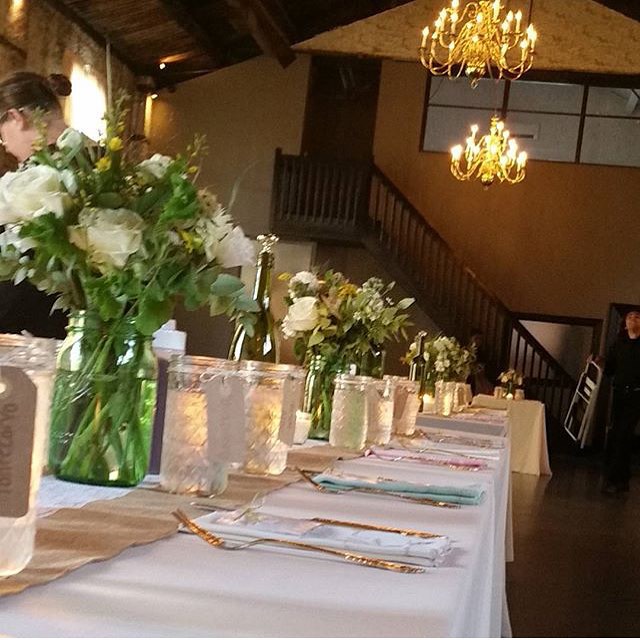 a vase of flowers on a table