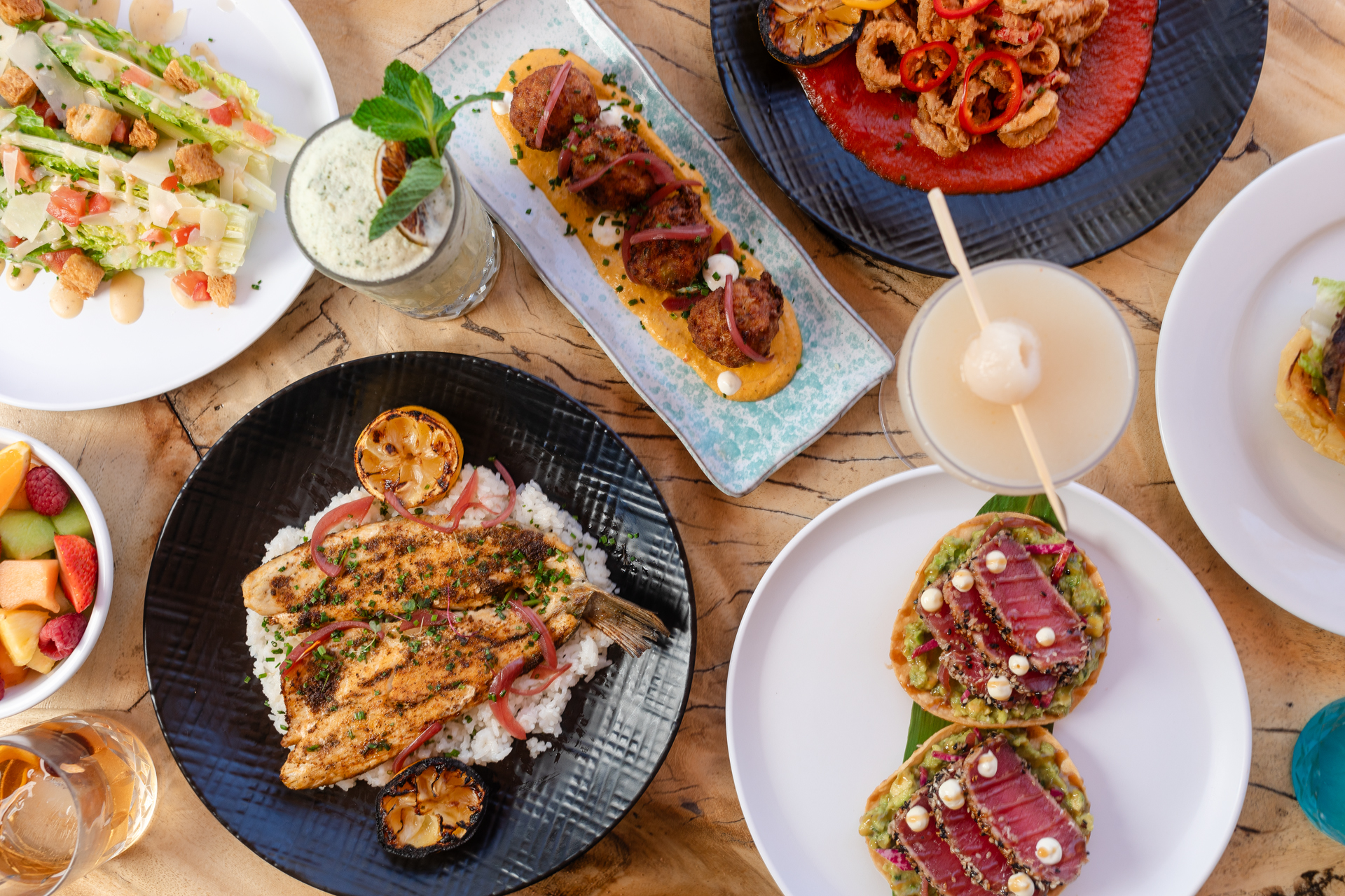 a table with several plates with food on it