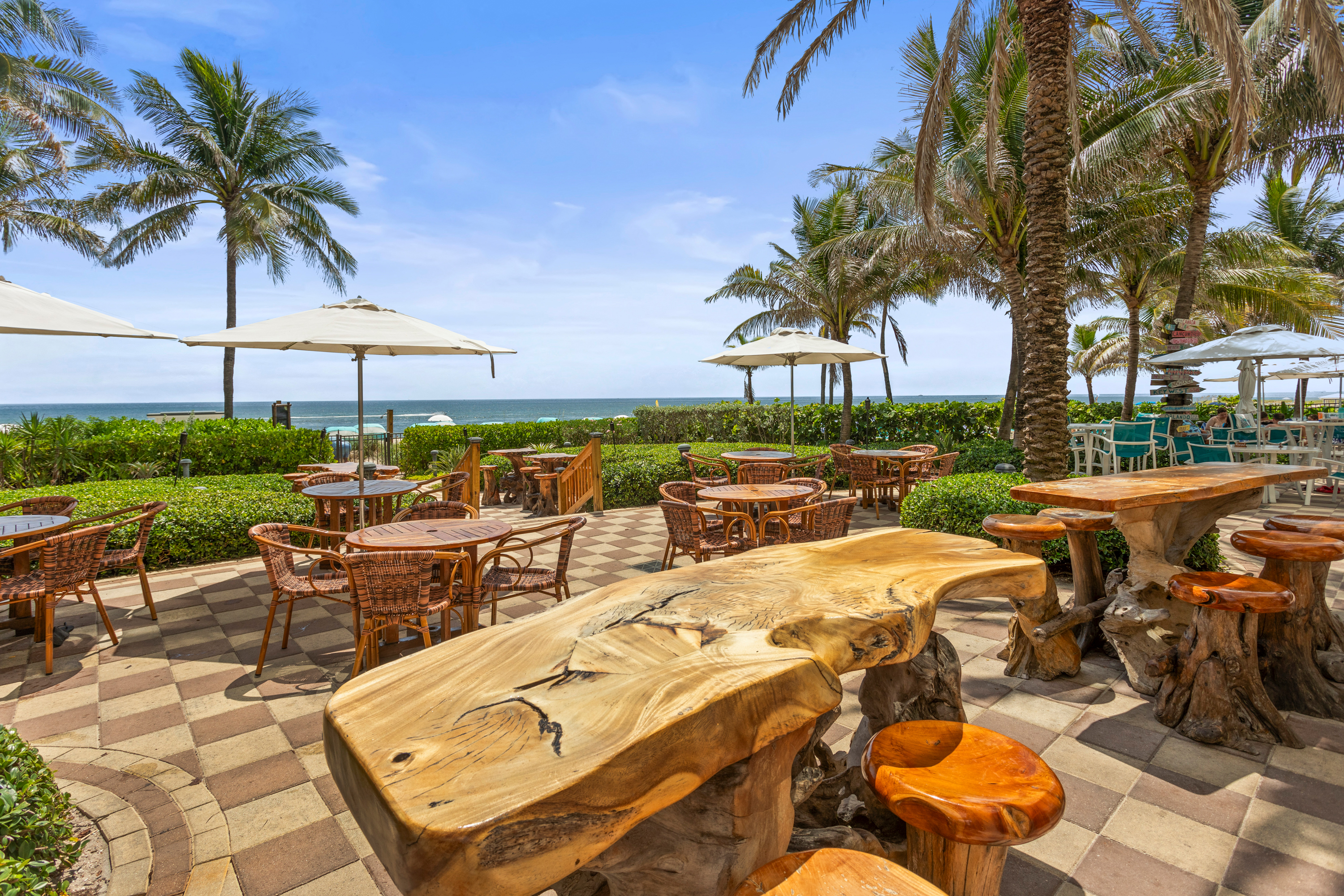 a table with chairs on an open space