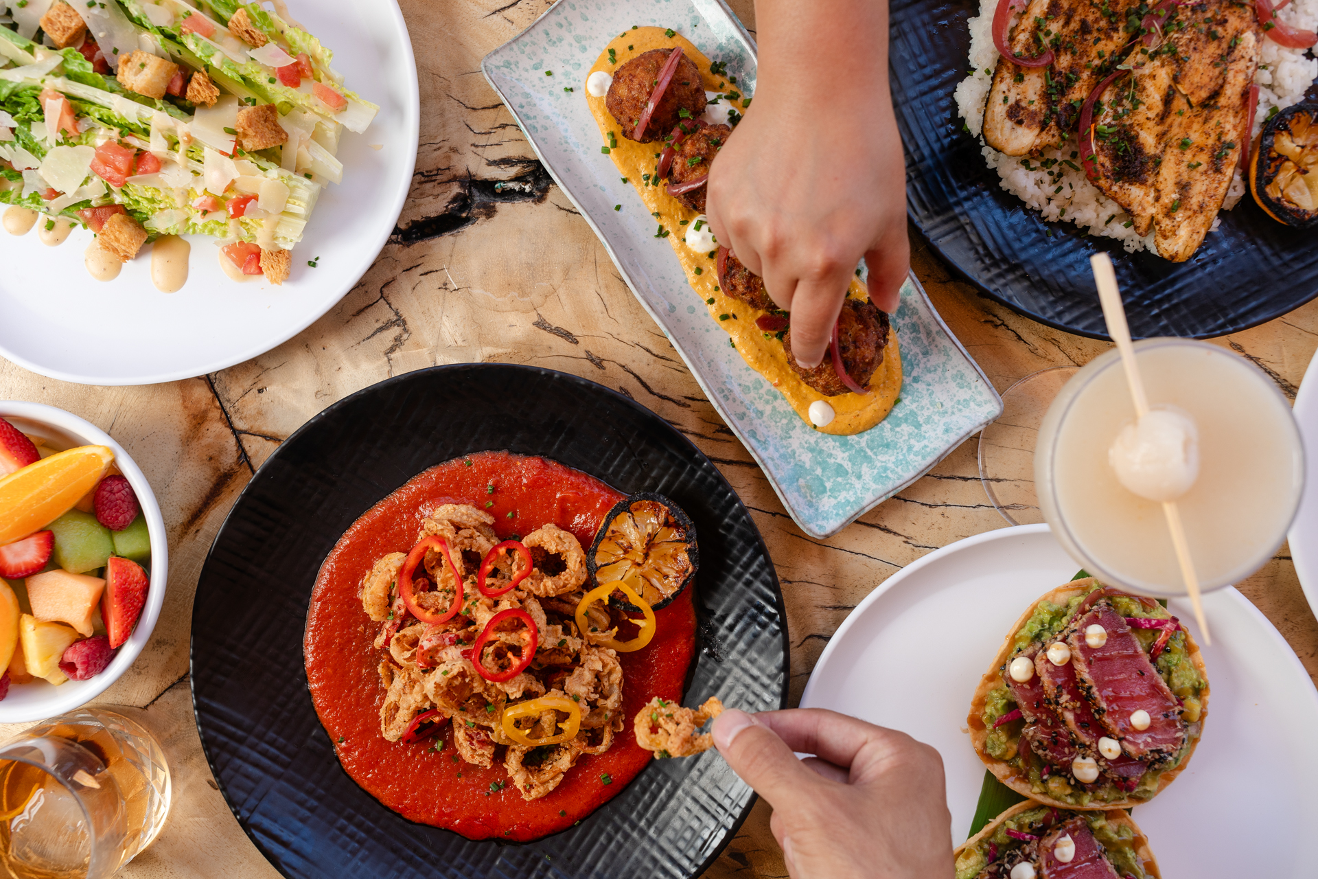 a table with several plates with food on it
