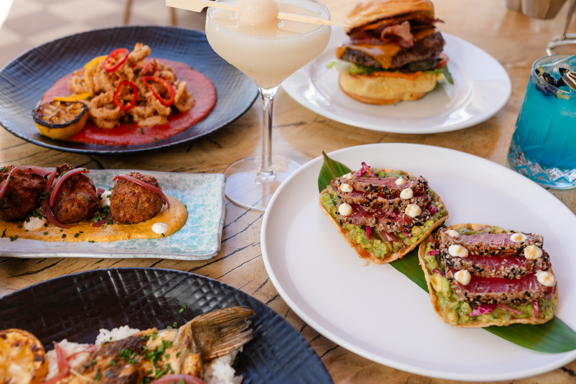 a table with several plates with food on it