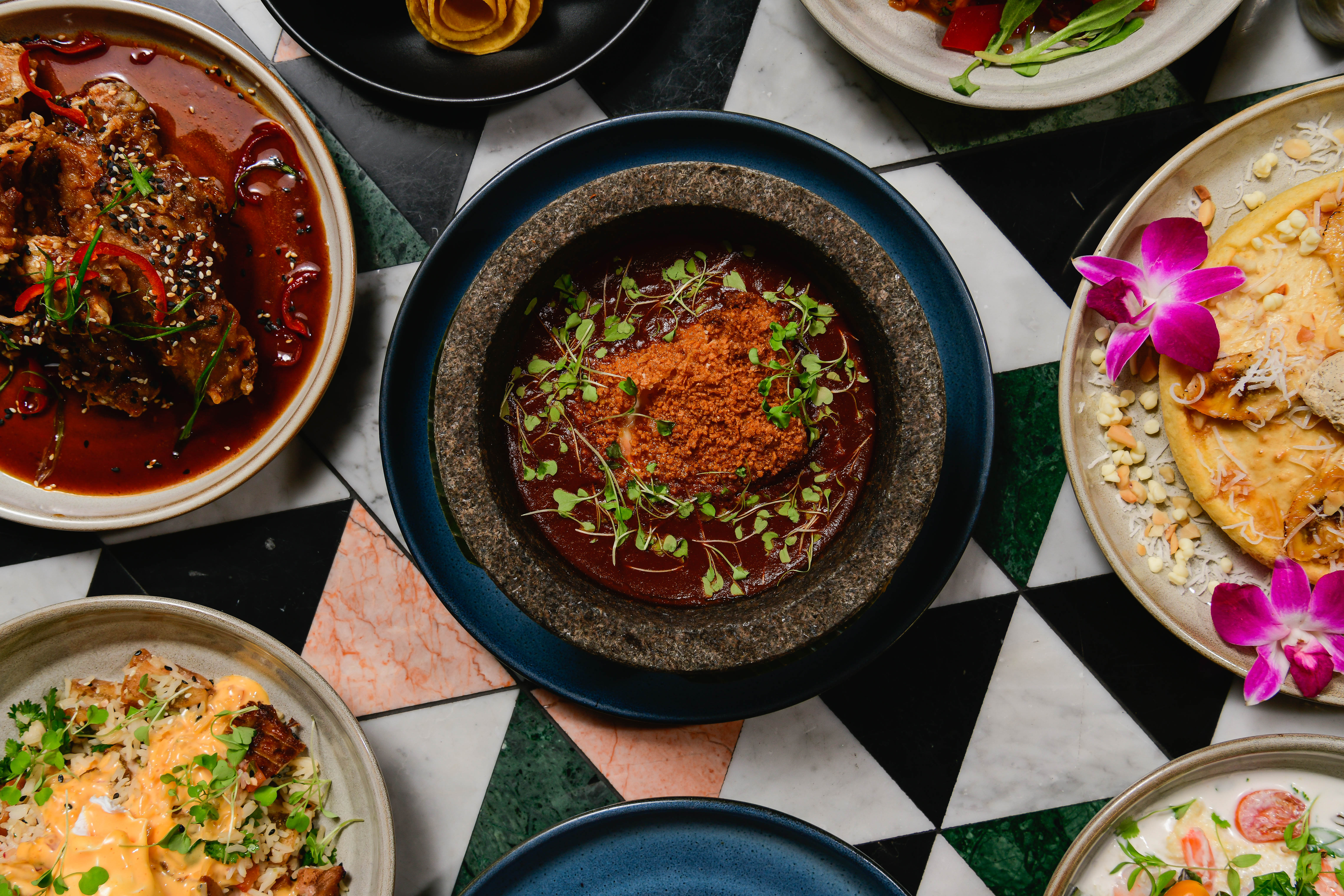 a bowl filled with different types of food on a plate