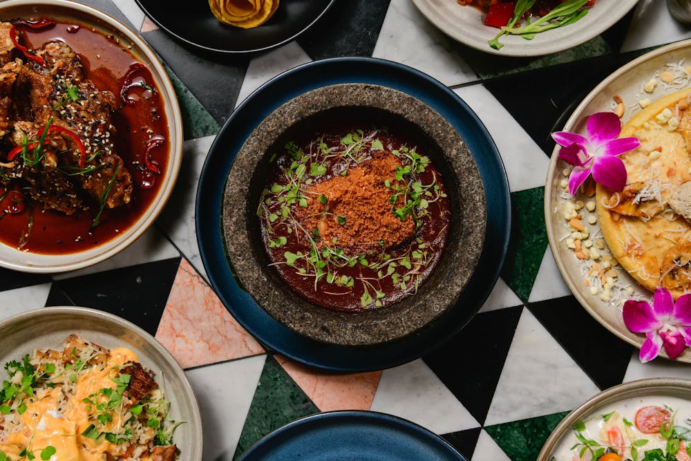 a bowl filled with different types of food on a plate