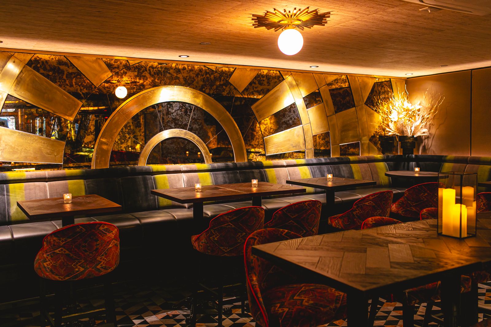 a room with a couch and table in a restaurant