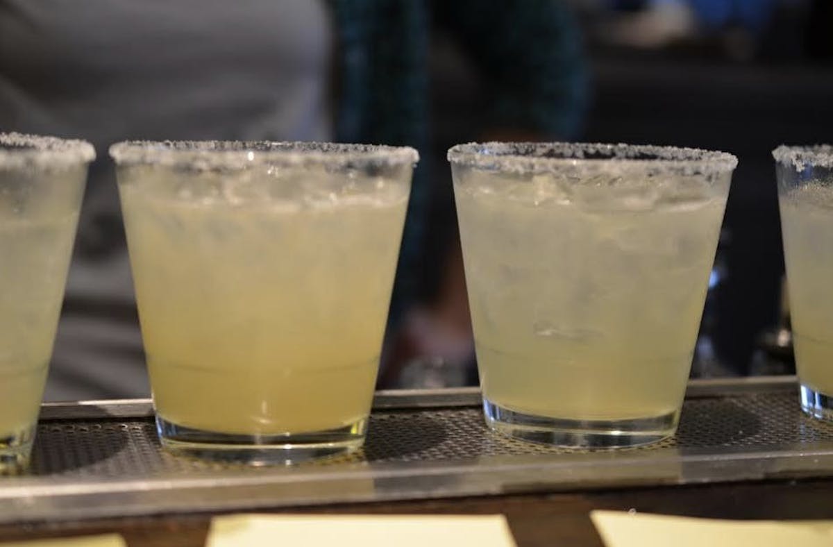 four margaritas served