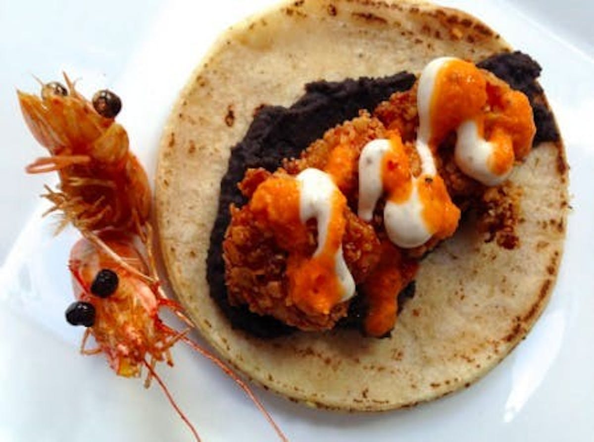 Boo! Refried black beans, tortilla-crusted shrimp, and beady eyes.