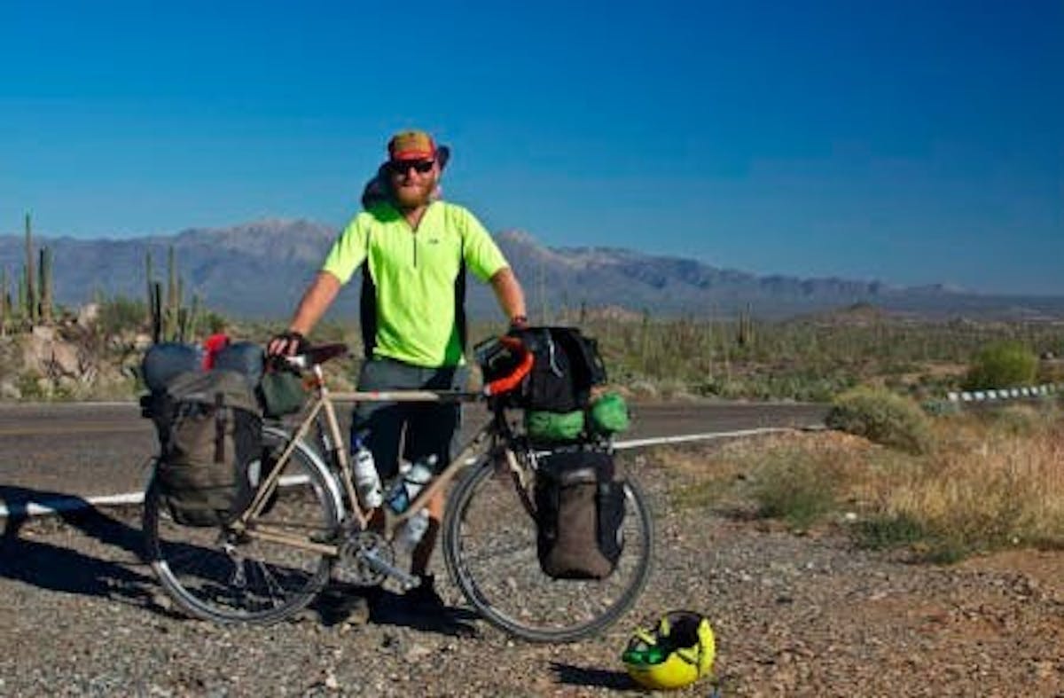our bartender jared crabtree posing in oaxaca, mexico with his bicycle