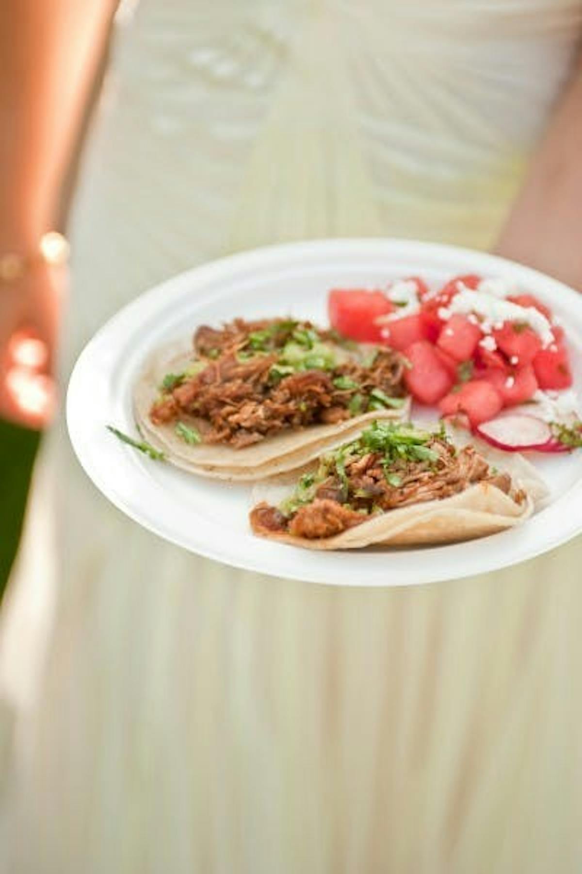 two tortillas and diced tomatoes with radish