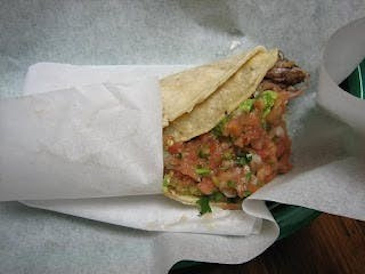 a taco between paper