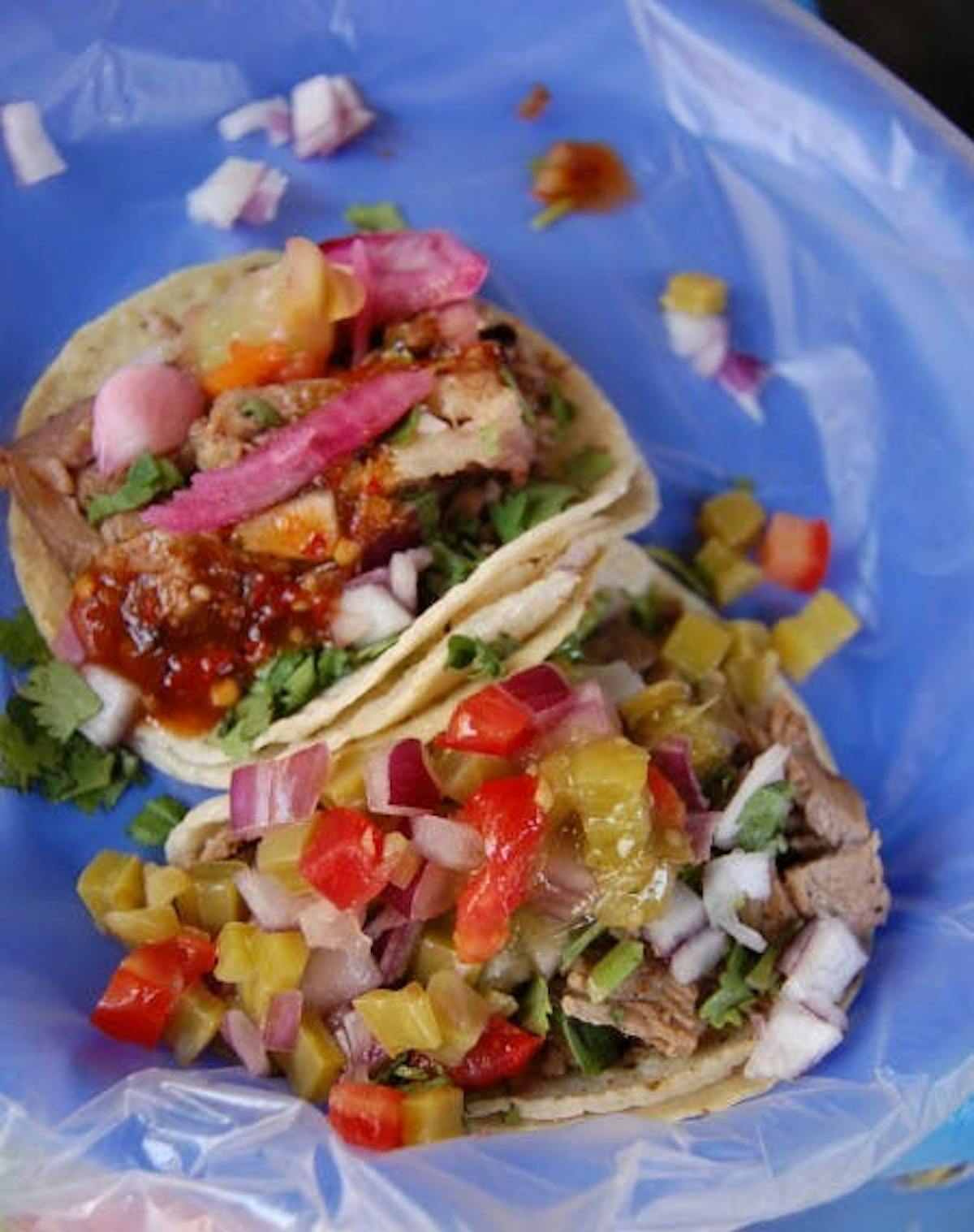 photo of well done tacos with steak and a bunch of toppings