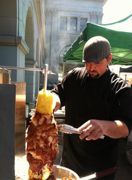 Telmo, on his way to mastering the al pastor spit.