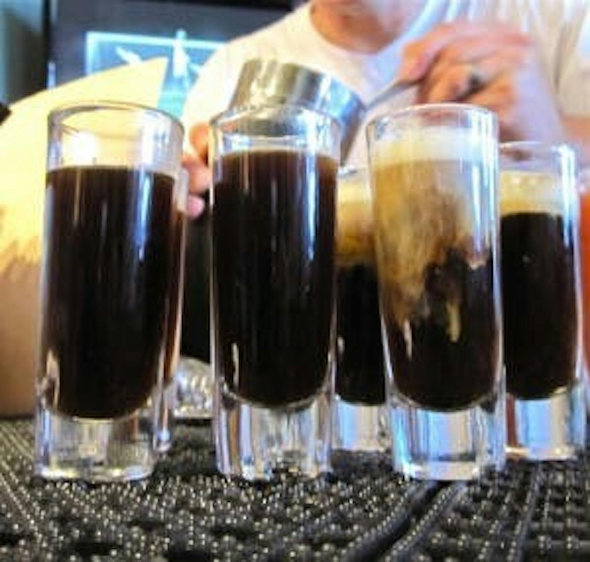 a bunch of glasses of cafe corregido