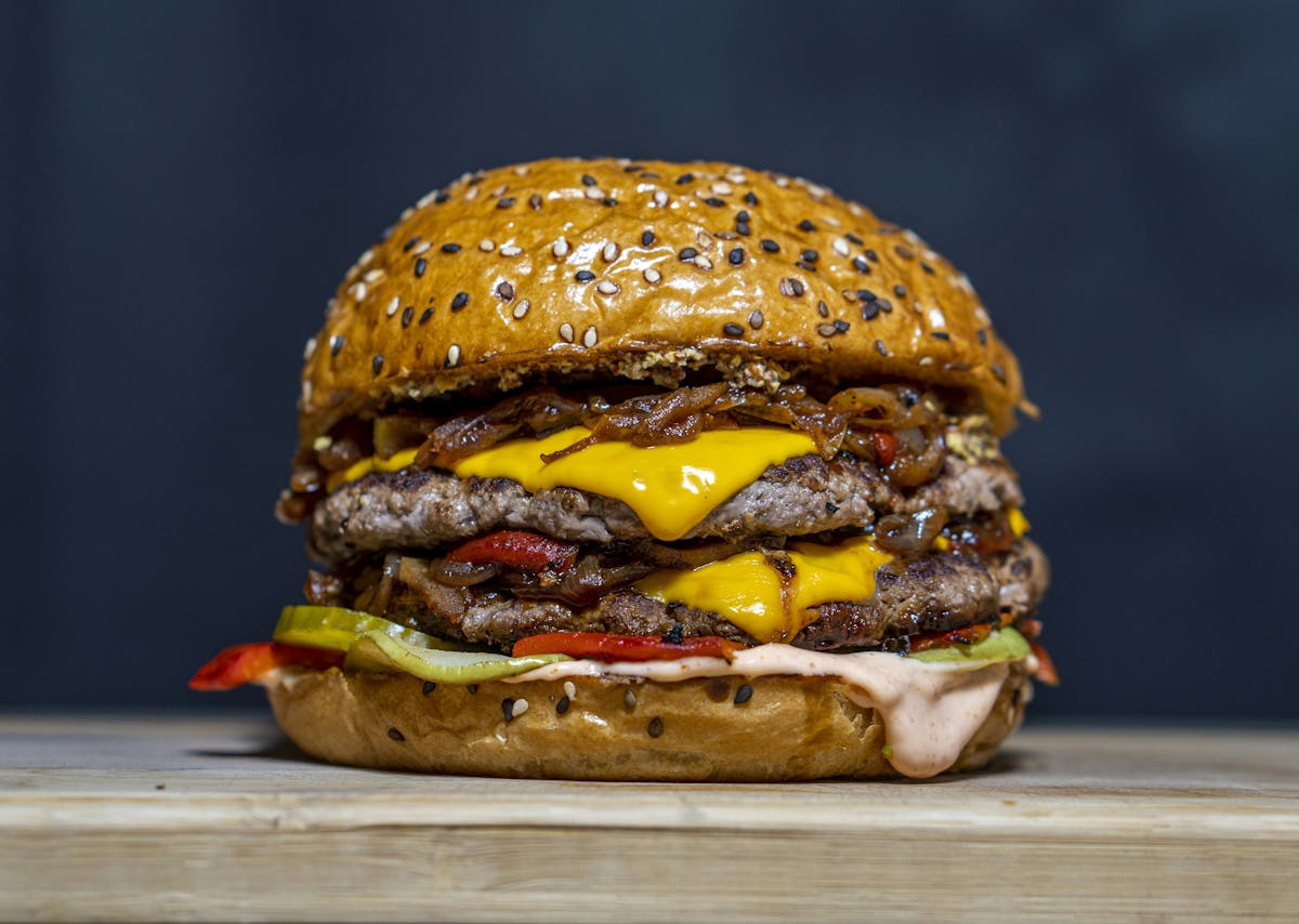 a sandwich sitting on top of a wooden table