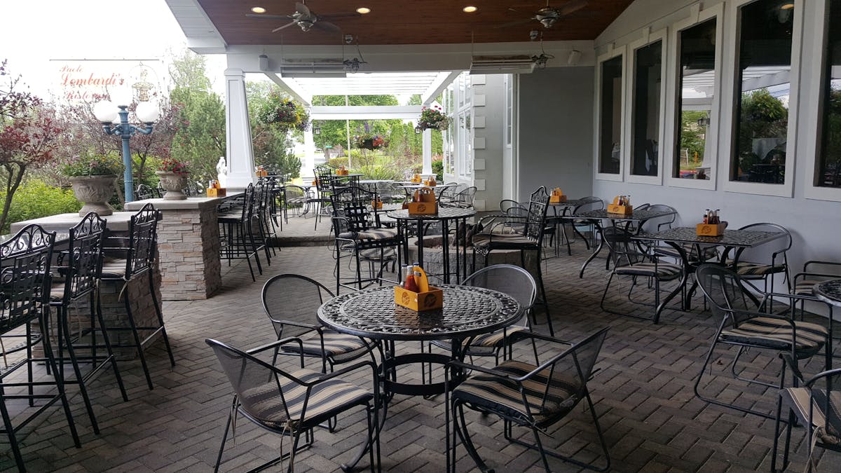 a dining room table in front of a building
