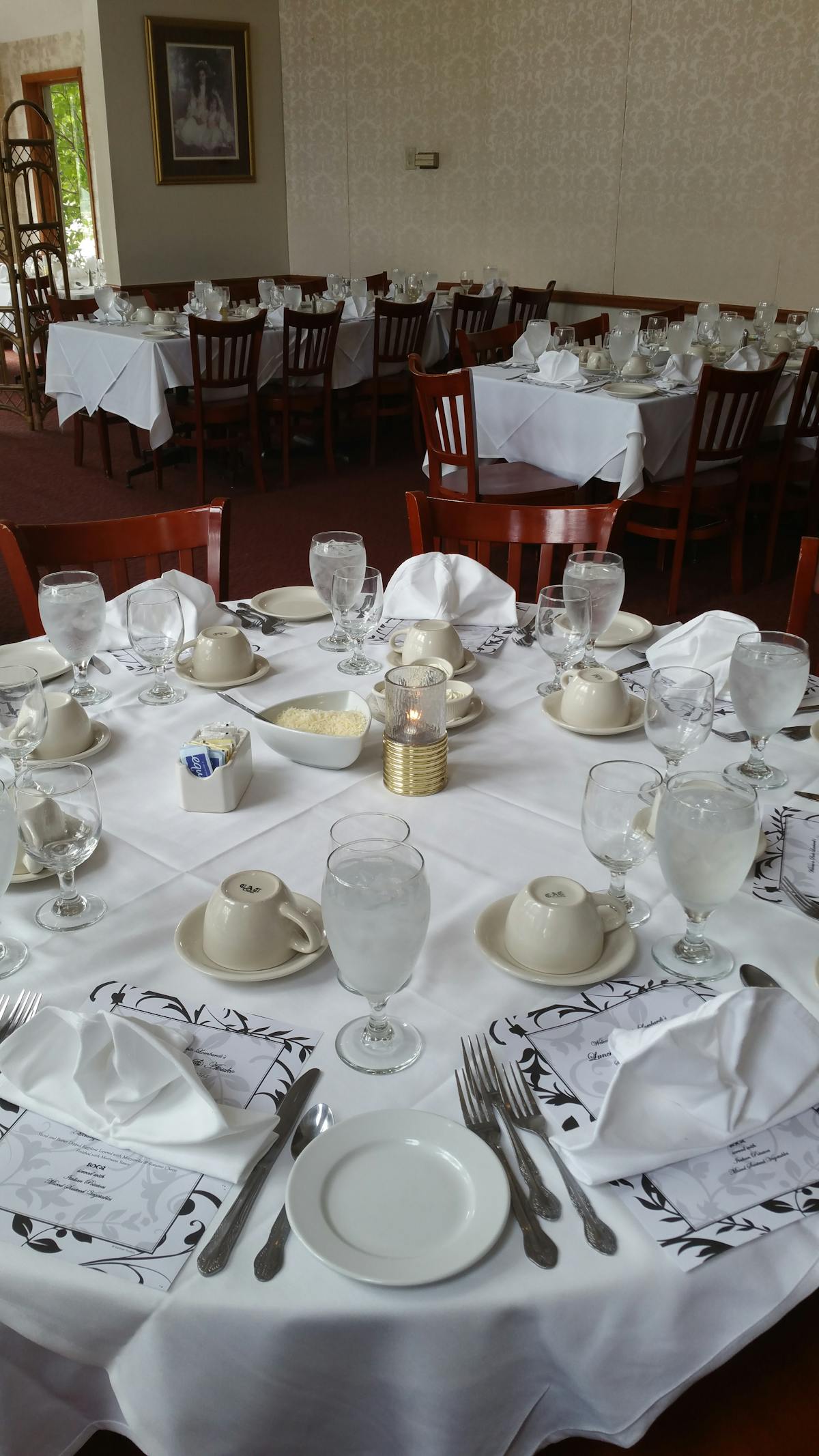 a dining table filled with wine glasses