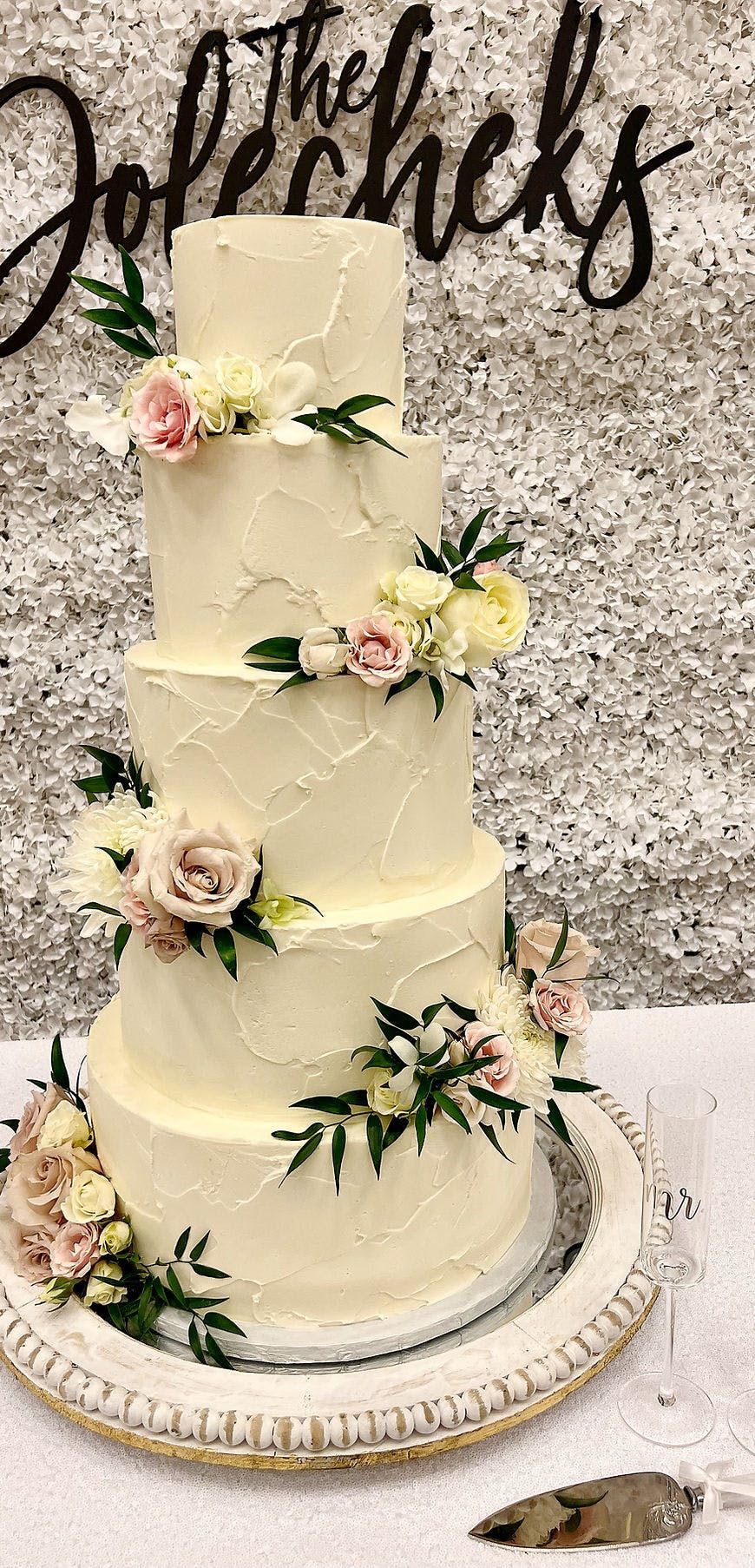 a wedding cake with flowers