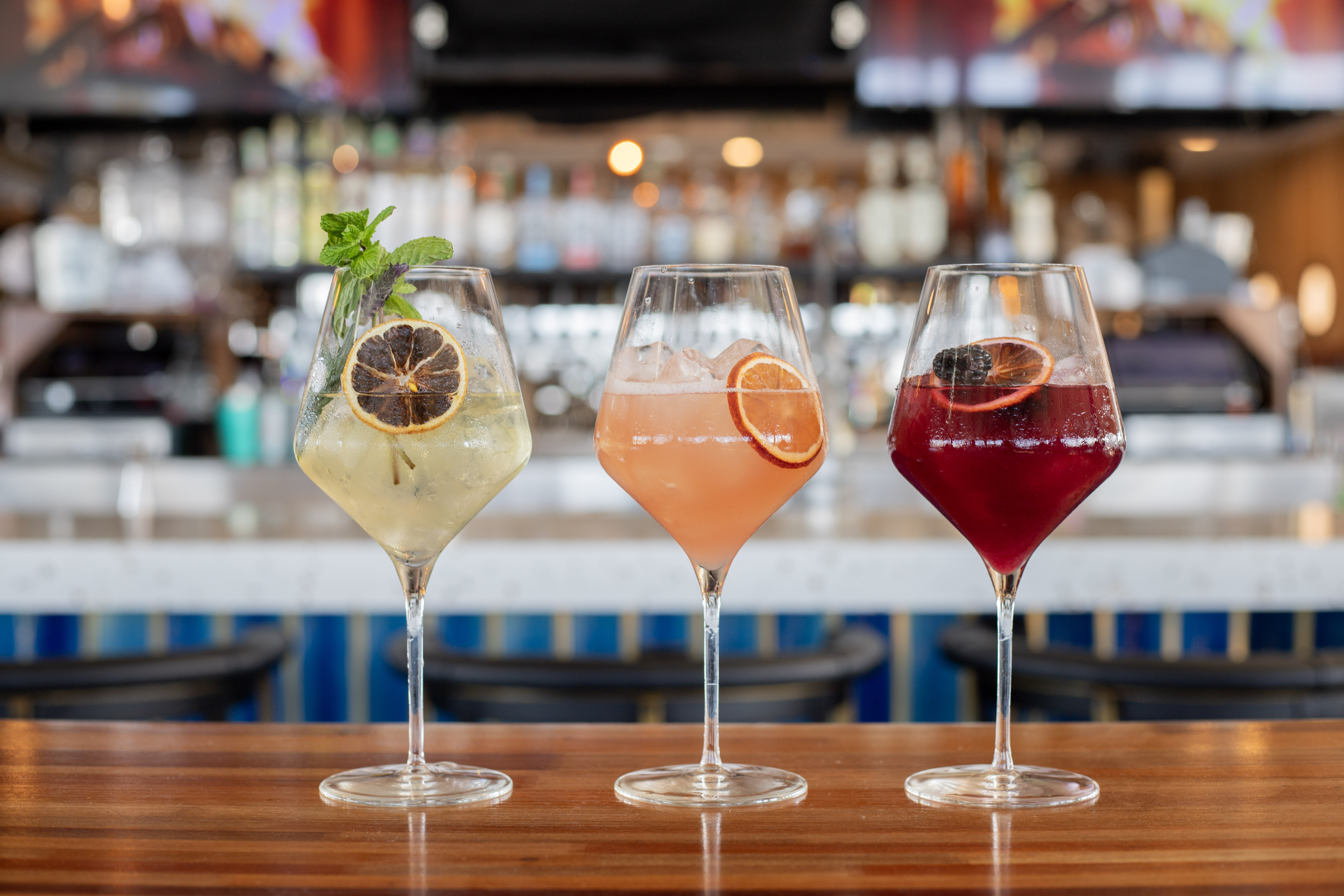 a close up of an empty wine glasses sitting on a table
