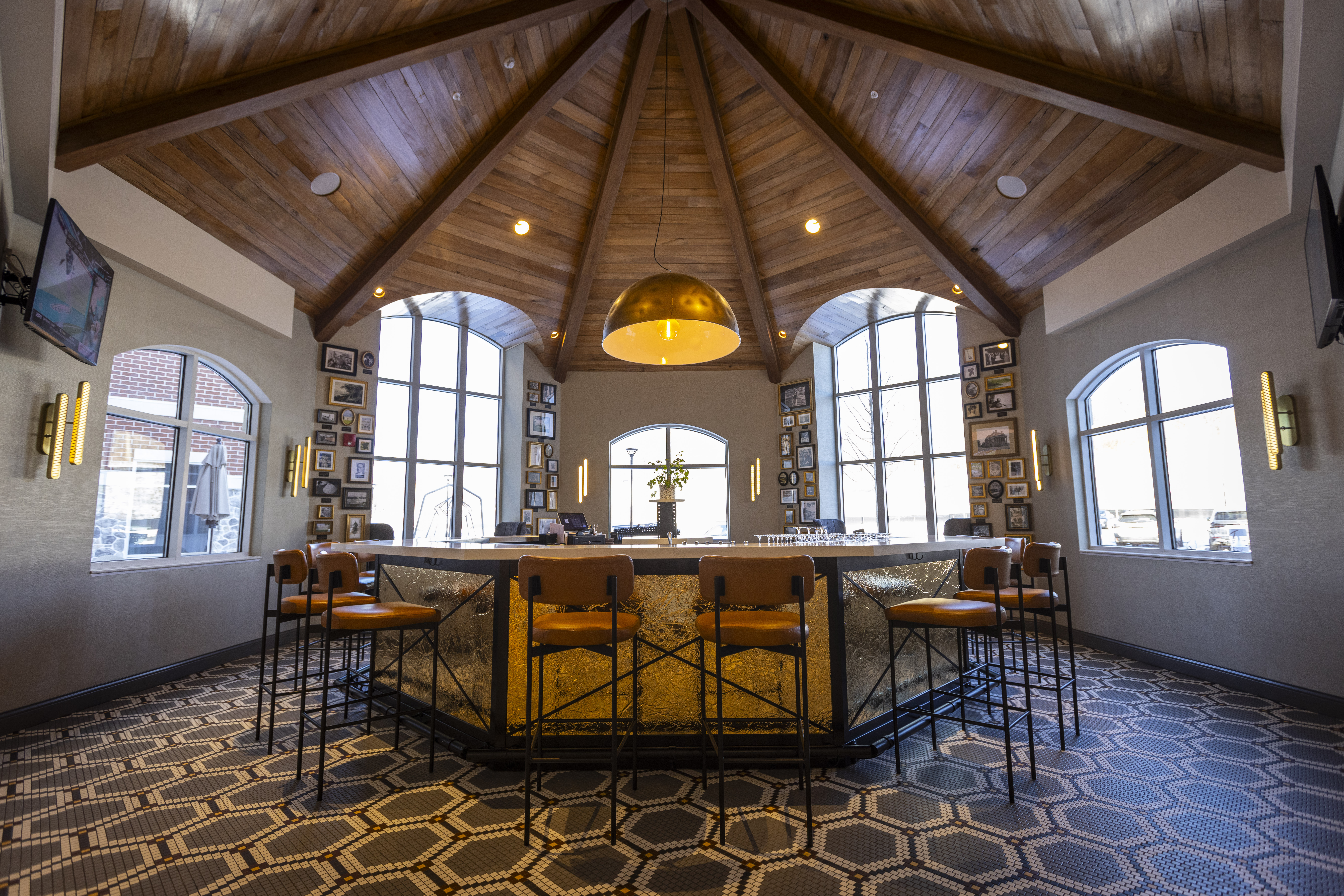 a room with a large table and chairs