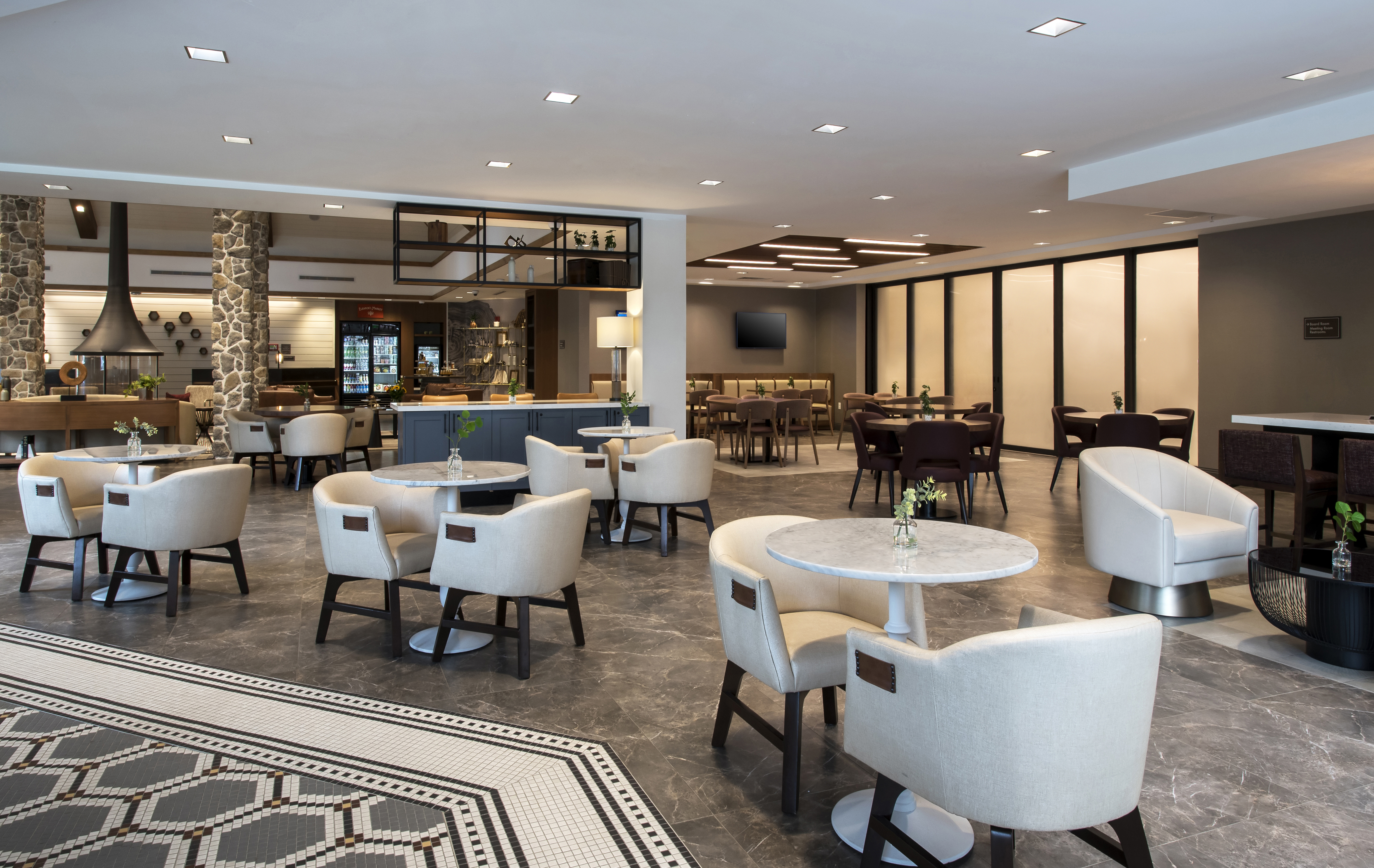 a room with tables and chairs