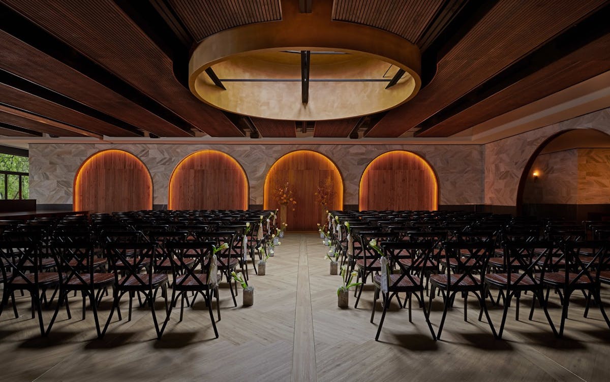 a row of wooden benches sitting on top of a table