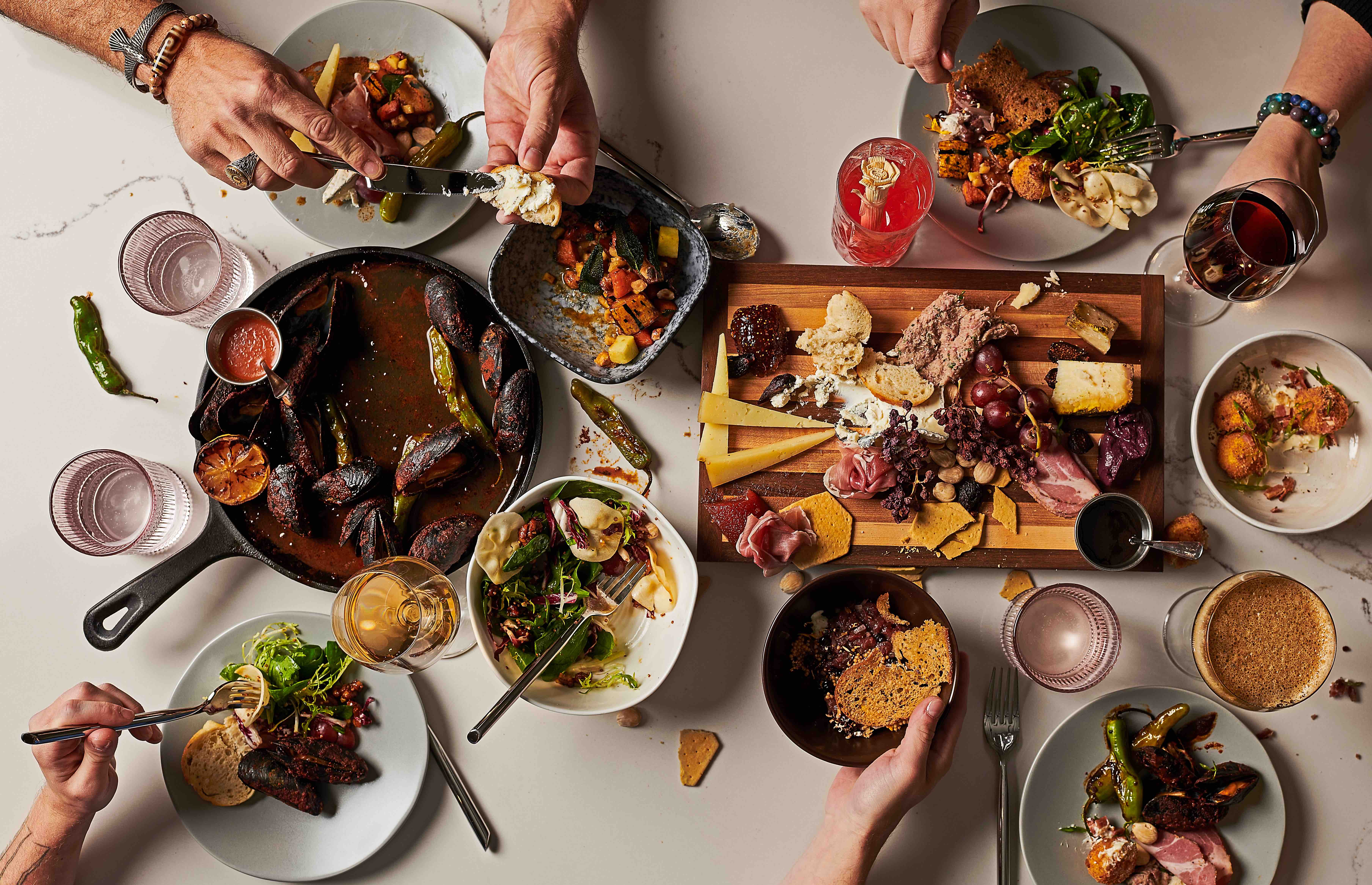 a table filled with small plates