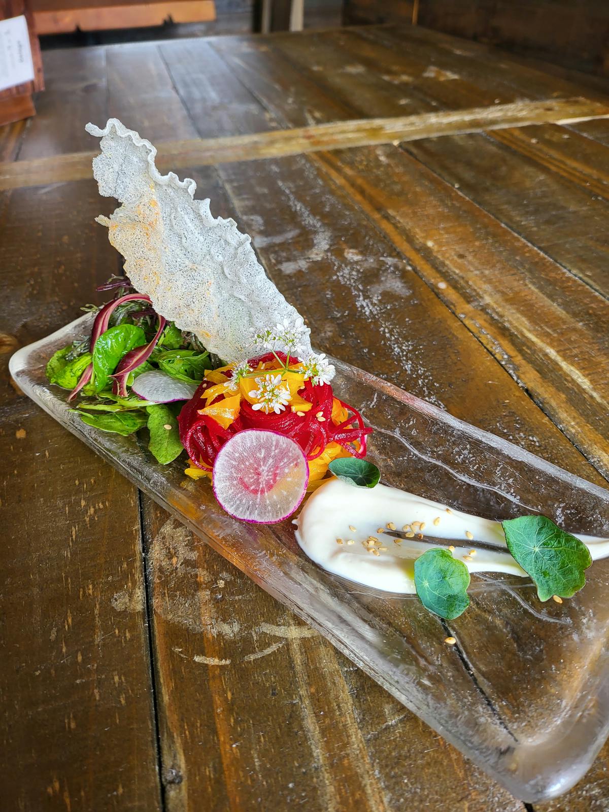 a piece of cake sitting on top of a wooden table