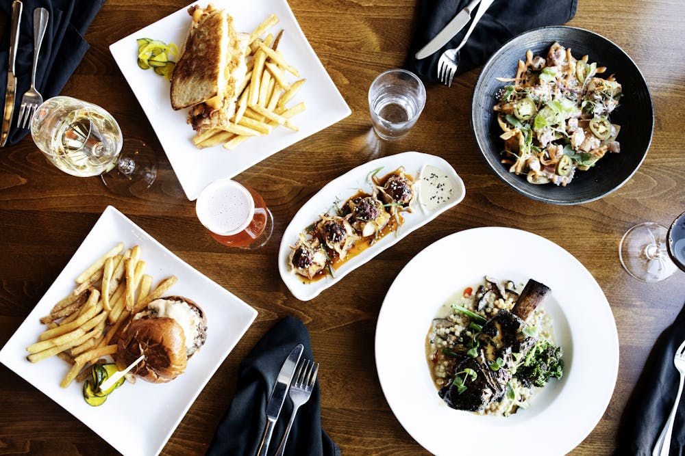 a bunch of food on a plate on a table