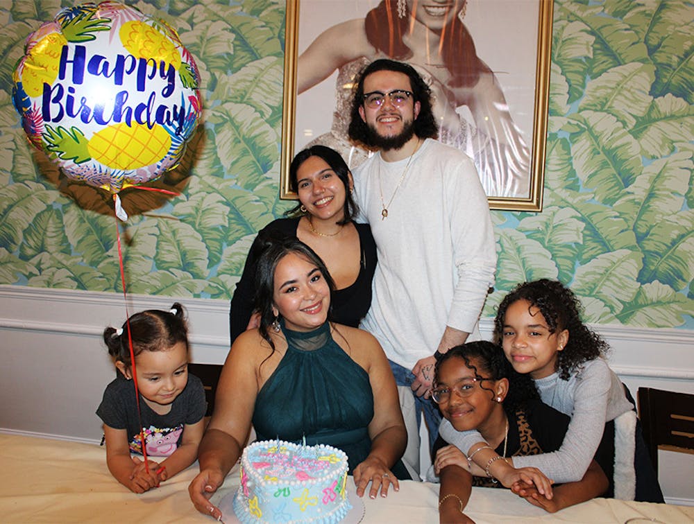 Family celebrating at birthday party place near Lower East Side, Manhattan NY.