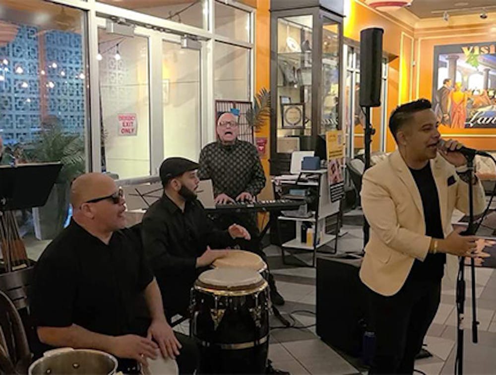 Four musicians at our Williston Park live music restaurant.