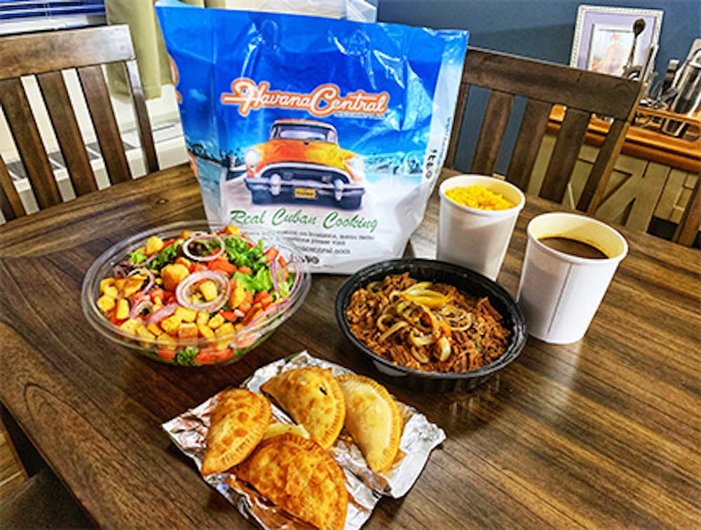 Cuban cuisine of empanadas, salad and rice served by Cuban food caterers near Avenel, Woodbridge Township, New Jersey.