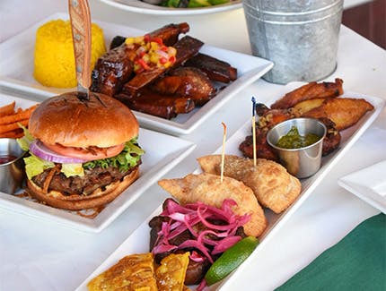 Burgers, ribs, and empanadas served at our Cuban restaurants near Upper East Side, Manhattan, New York.