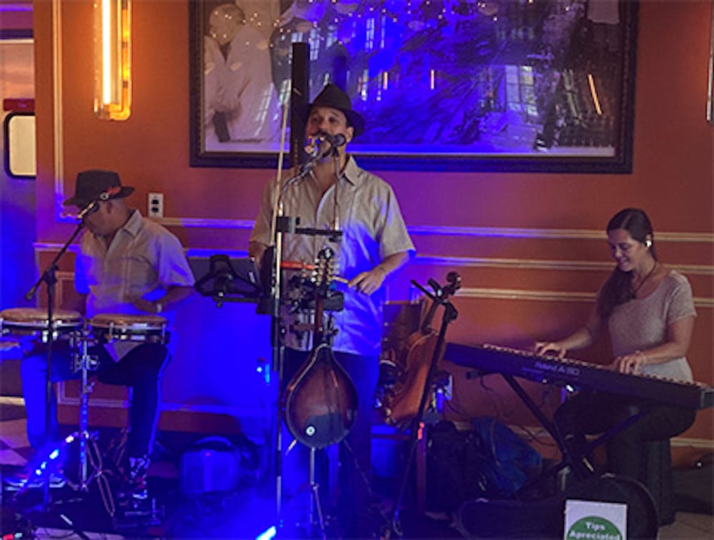 Three musicians at our Menlo Park Mall, Edison live music restaurant.