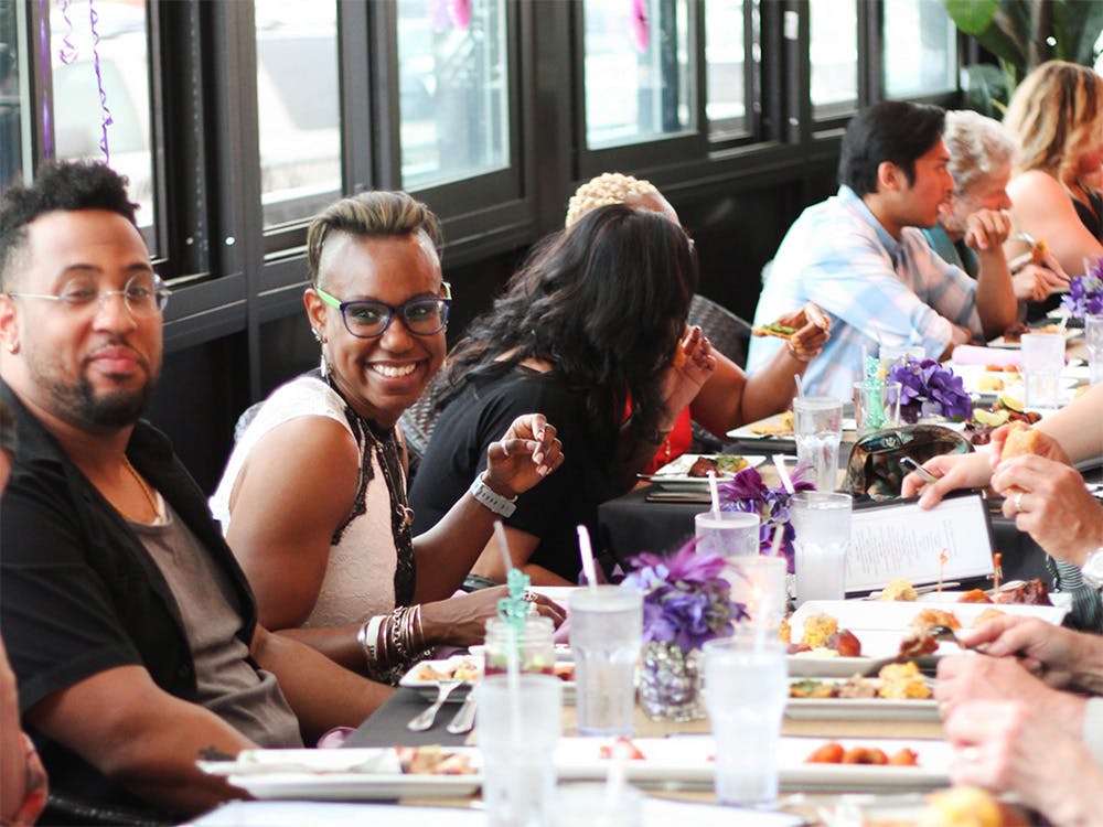 A group of people sitting at a table and celebrating at our party venue near Avenel, Woodbridge Township, NJ.