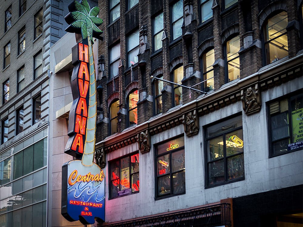 Guest enjoying delicious Cuban dishes served by Havana Central's Cuban food catering near Manhattan, NY.