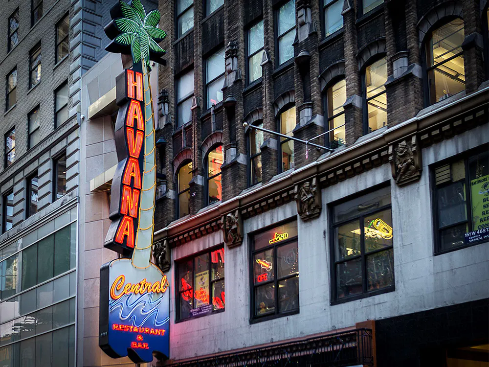 Guest enjoying delicious Cuban dishes served by Havana Central's Cuban food catering near Manhattan, NY.