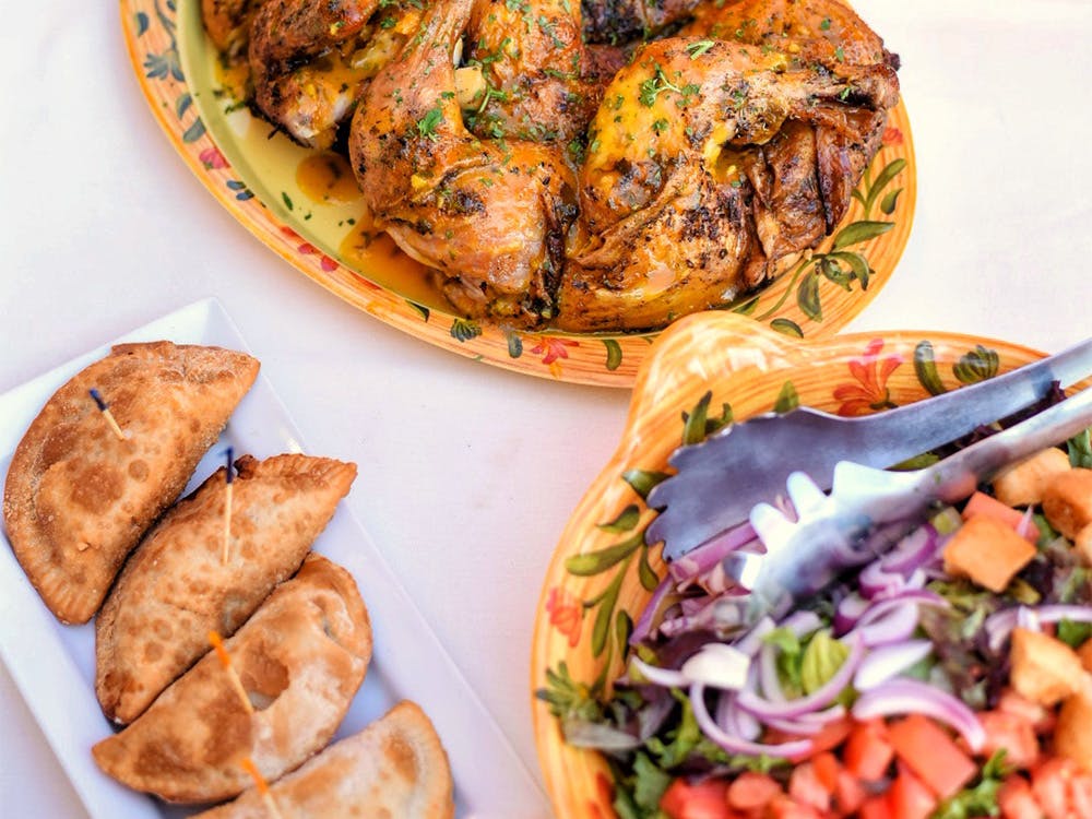 Latin whole suckling pig roast served by Cuban food caterers near Manhattan, New York.