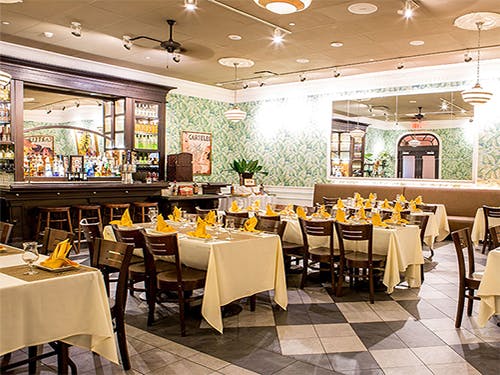 Guests enjoying delicious Cuban dishes served by Havana Central's Cuban food catering near Garden City, NY.