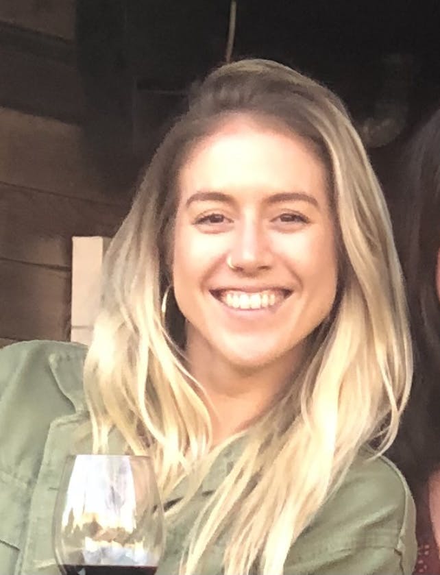 a woman smiling for the camera