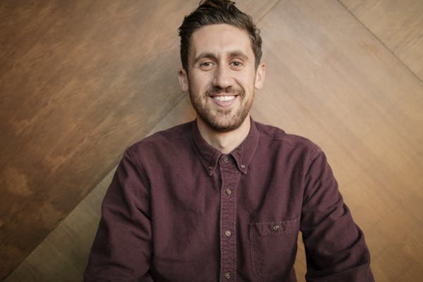 a man smiling for the camera