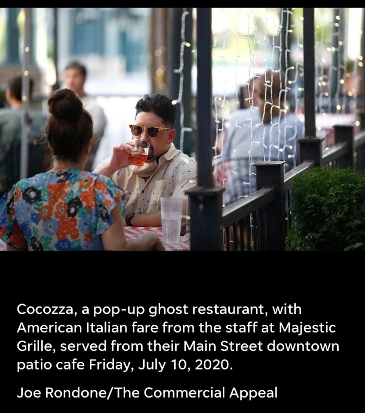 Guests enjoying cocktails on the Cocozza Patio