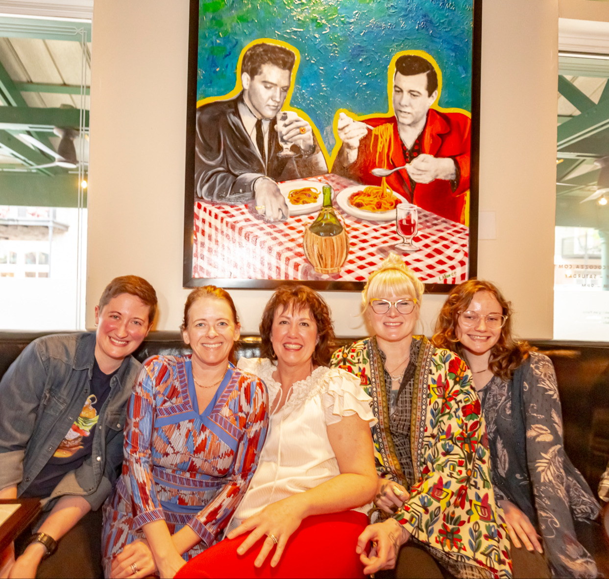 Cocozza Co-Owner Deni Reilly with artists and designers