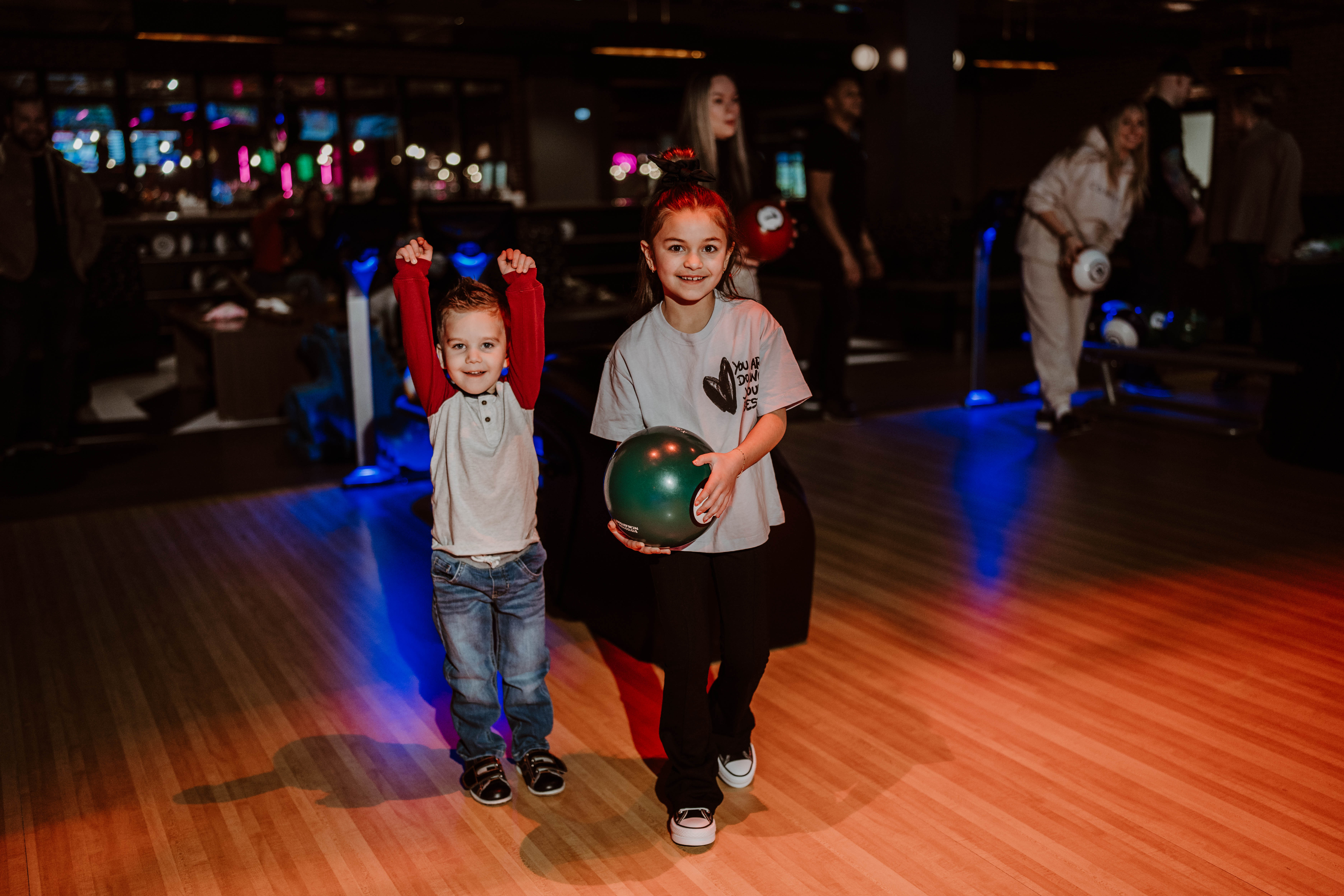 a little boy that is standing on the floor