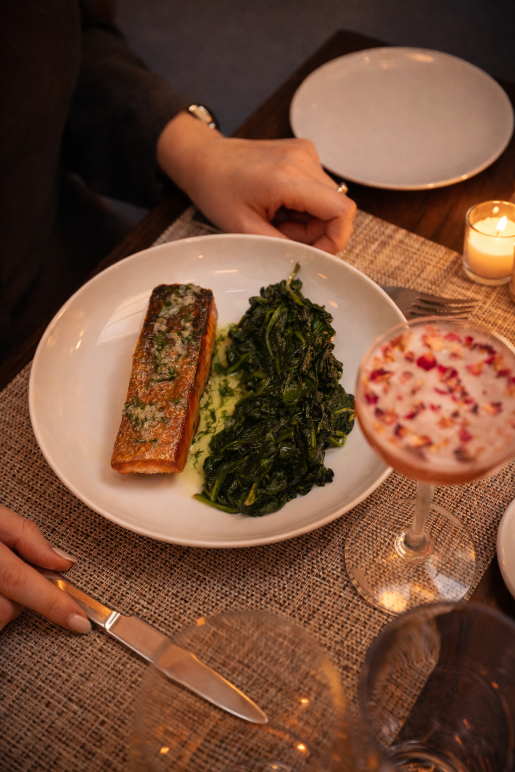 a dish with a drink on a table
