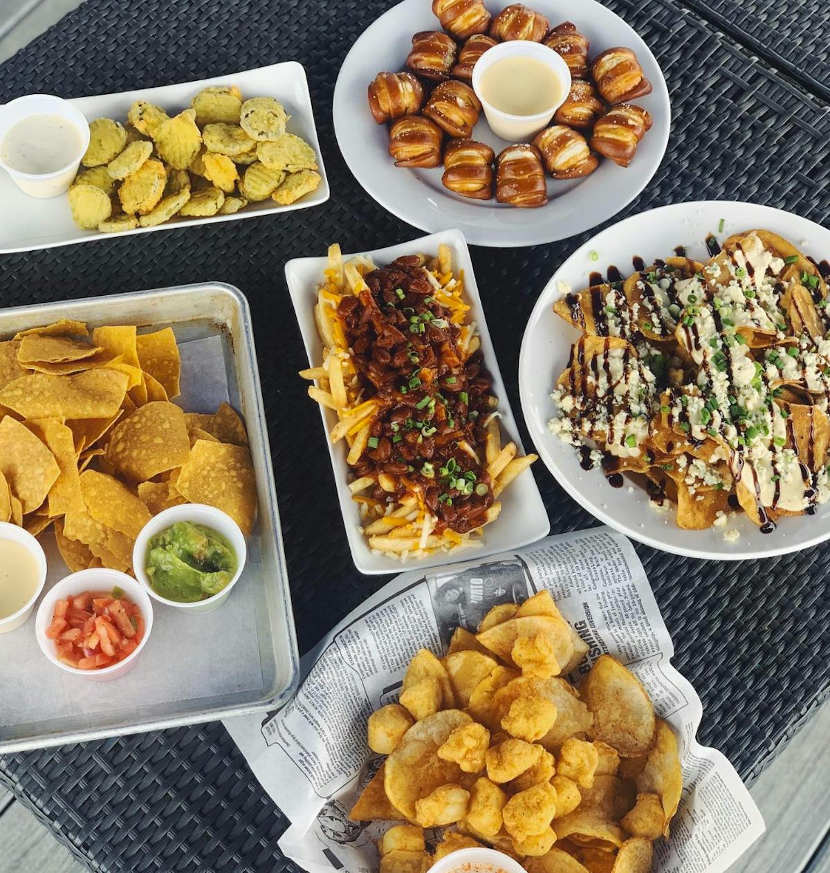 a bunch of different types of food on a table