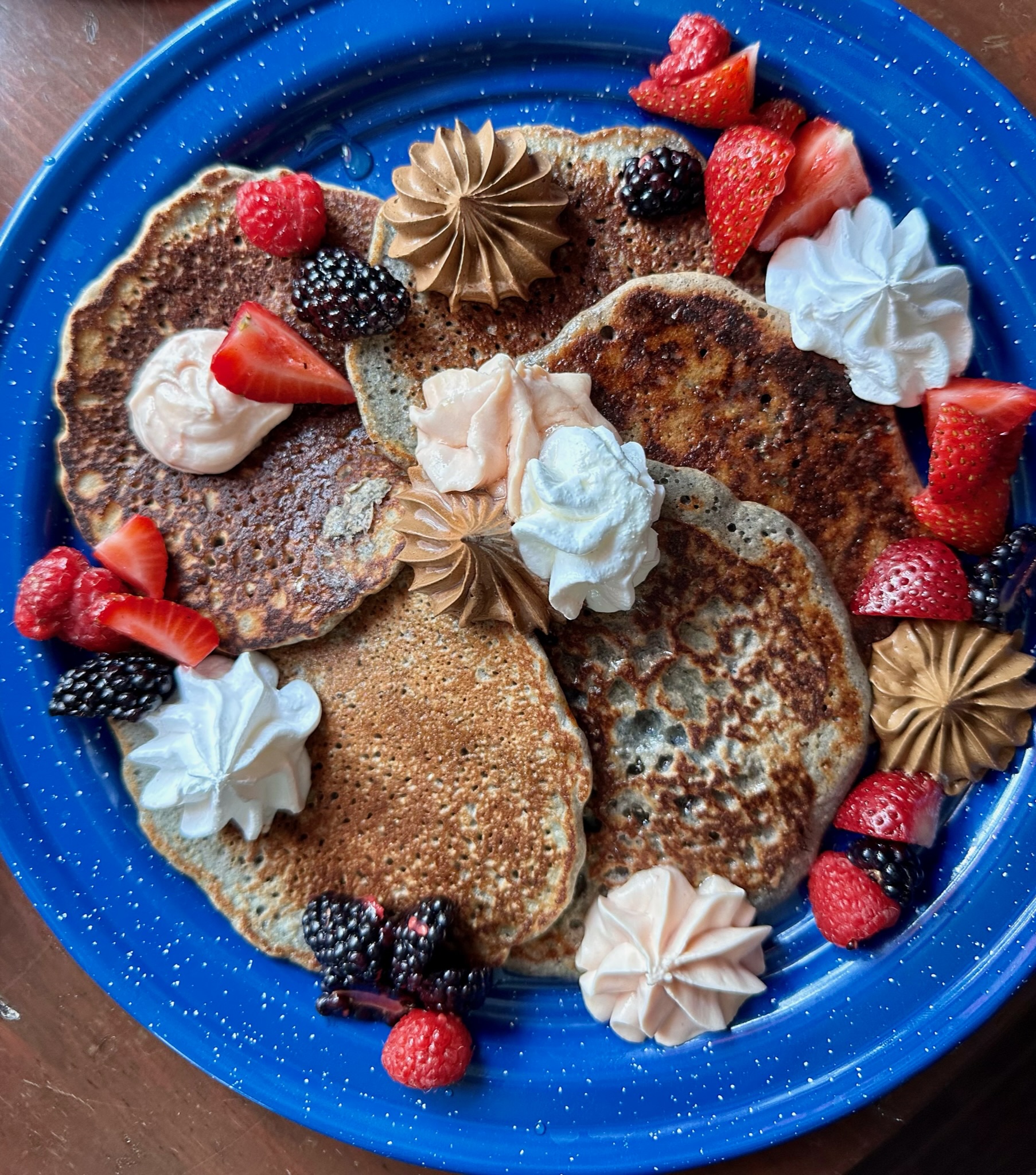 a blue plate topped with different types of food